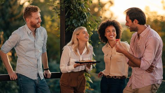 Two couples enjoying one of their backyard patios.